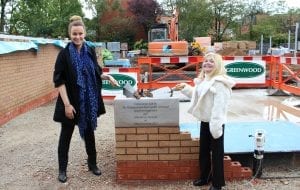 Camilla Al Fayed Kirsty Howard lay a cornerstone in 2012