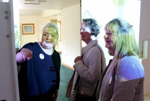 Hospice Care Team demonstrate the technology in the multi-sensory room to visitors