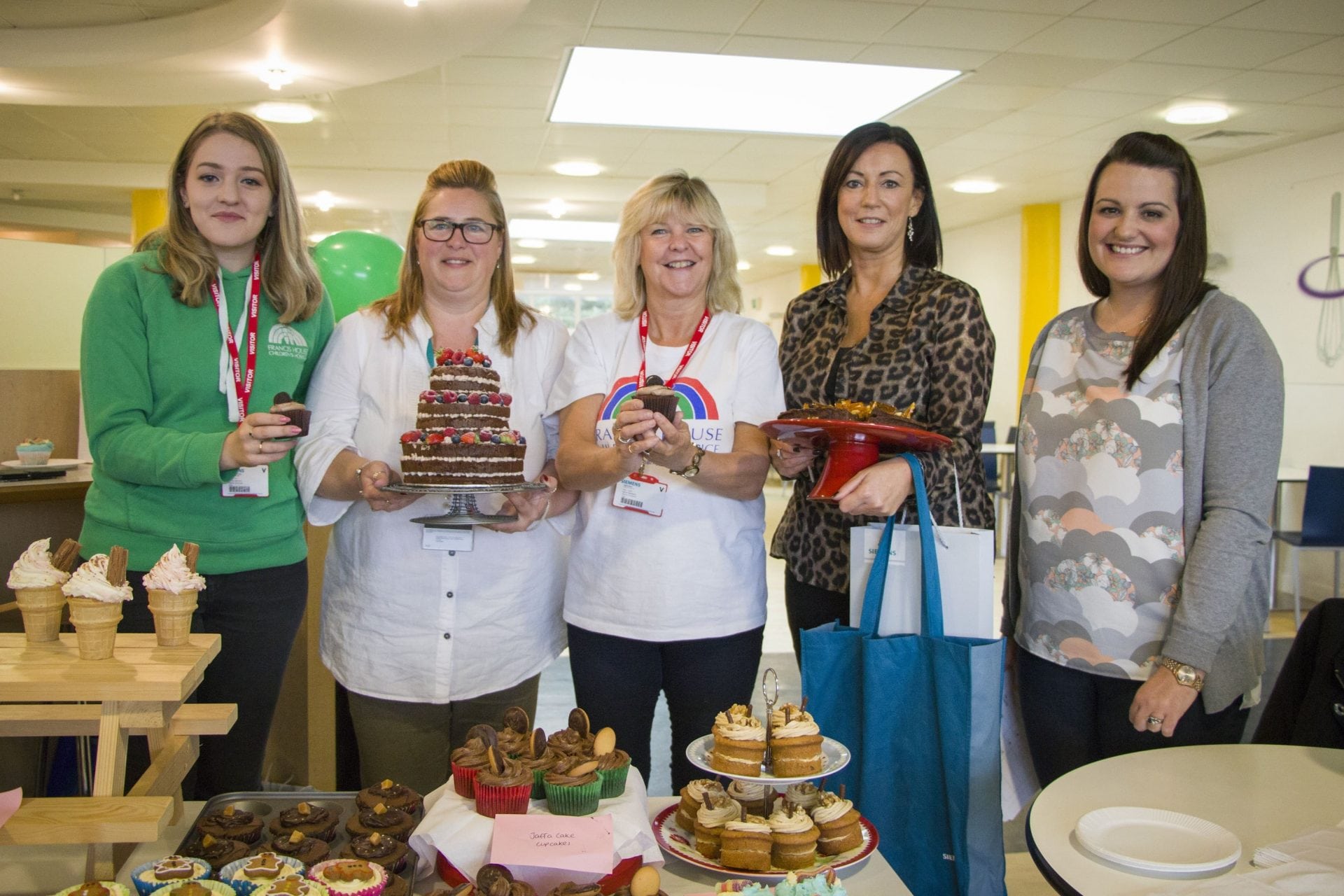 Staff at Siemens office cake bake