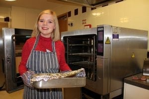 Volunteer Nicky in the kitchen at Francis Lodge