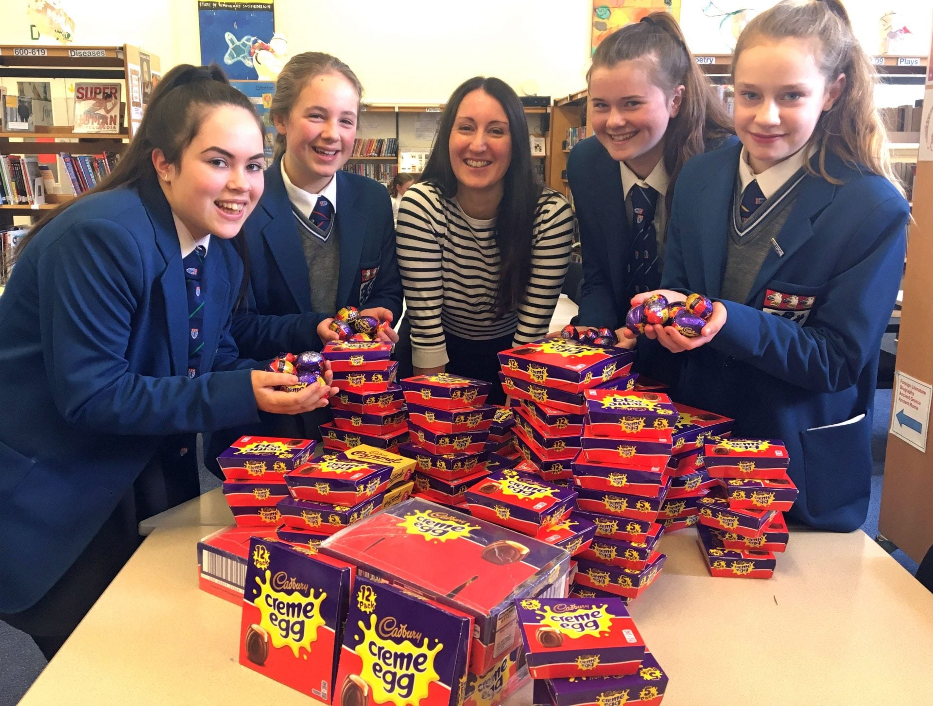 The Girls' Divison of The Kings School in Macclesfield donating 1191 eggs to Francis House fundraiser Lucy Thompson
