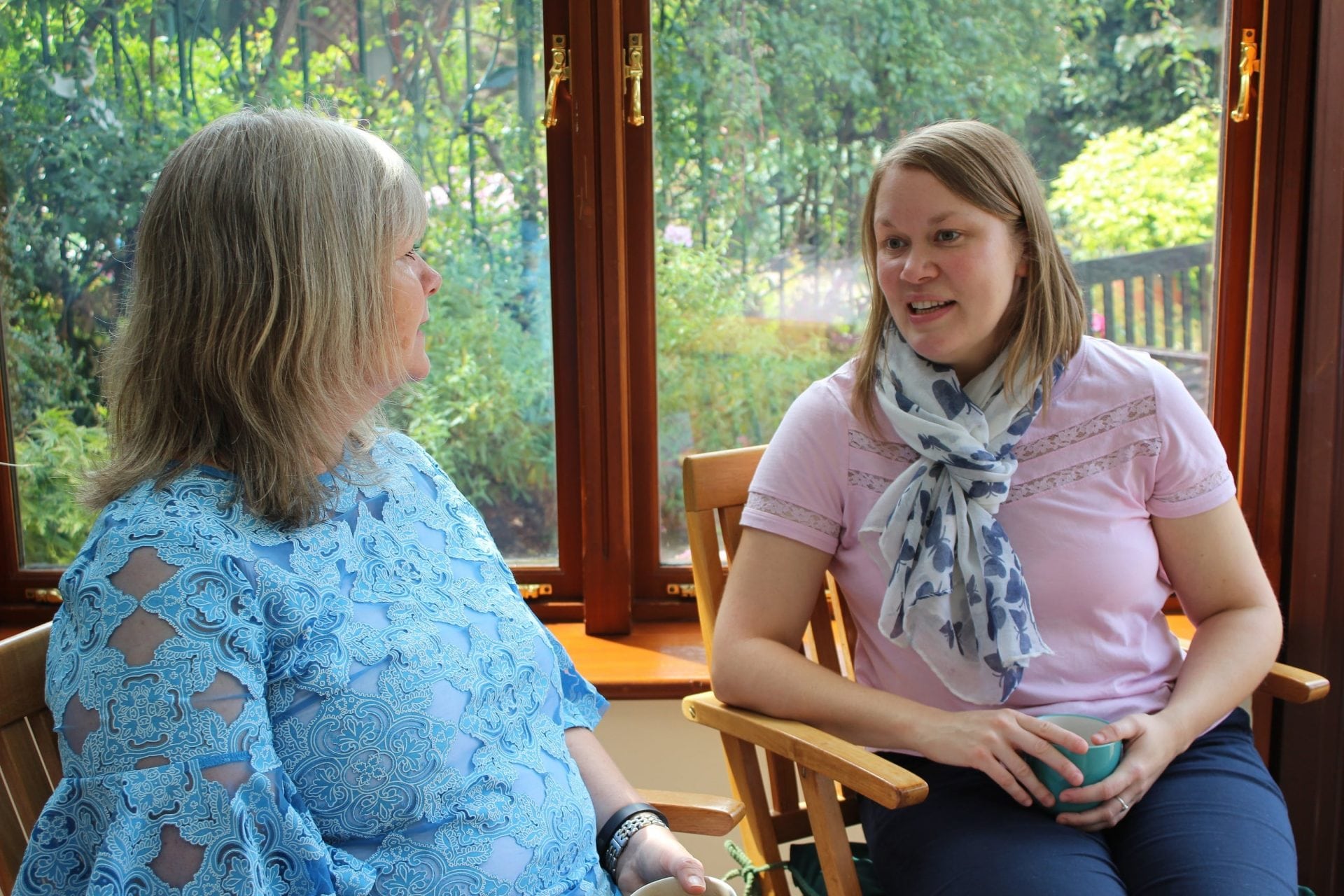 Care team Tracey listens to mum Christine