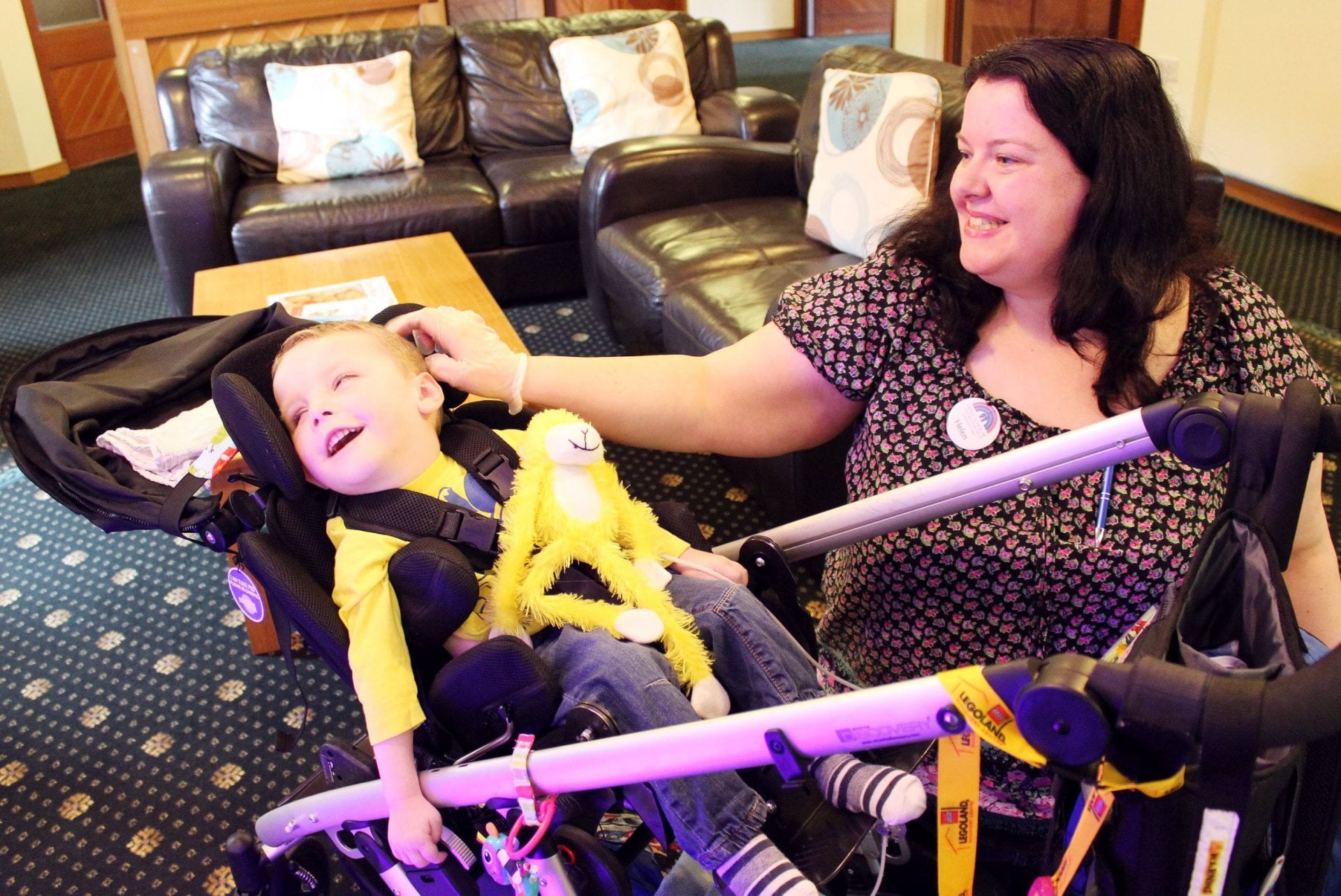 Jack laughs with care team Helen