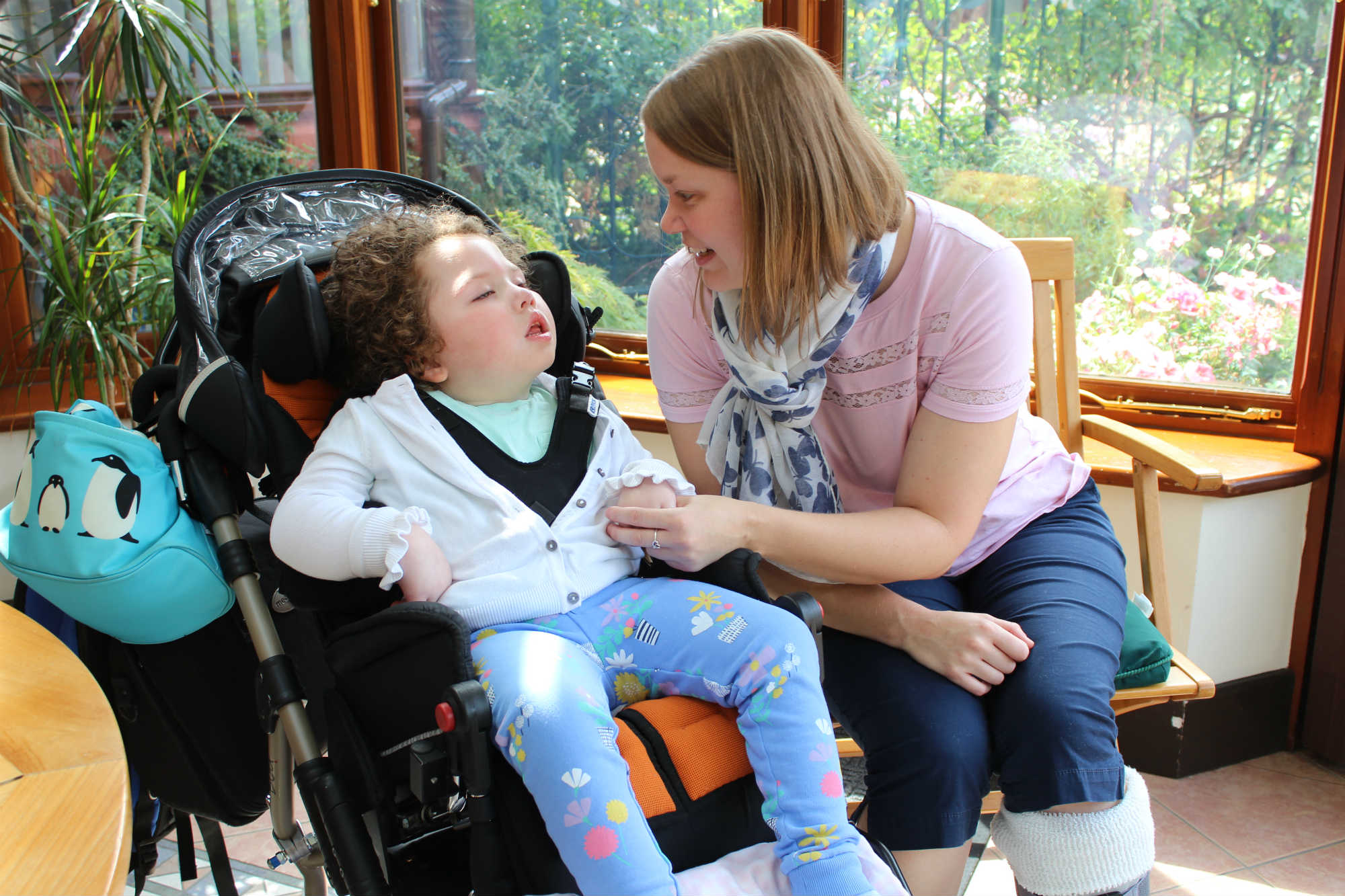 Parent and child in the conservatory