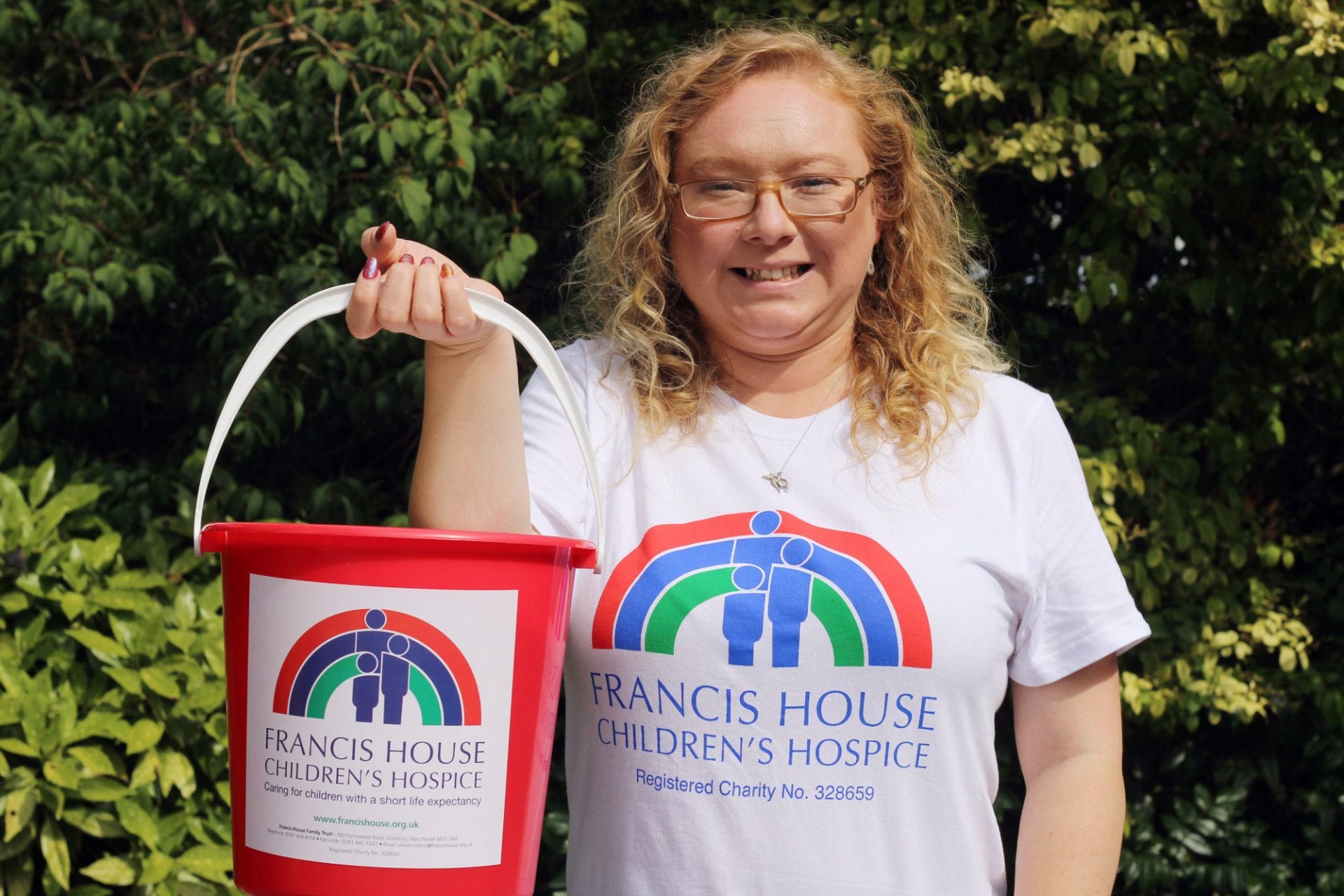 Fundraising volunteer Helen Finch with collection bucket