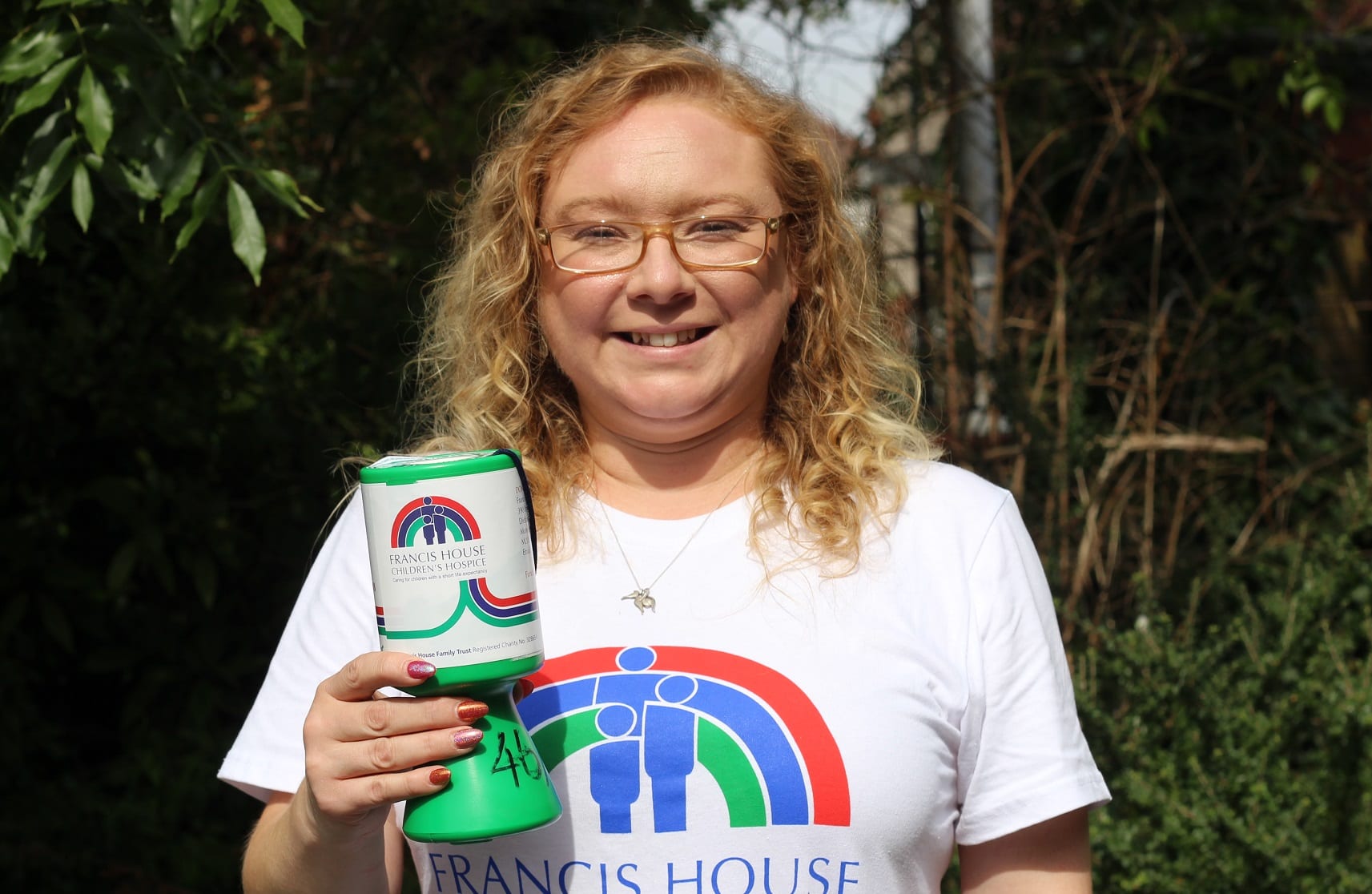 Volunteer Helen with collection box