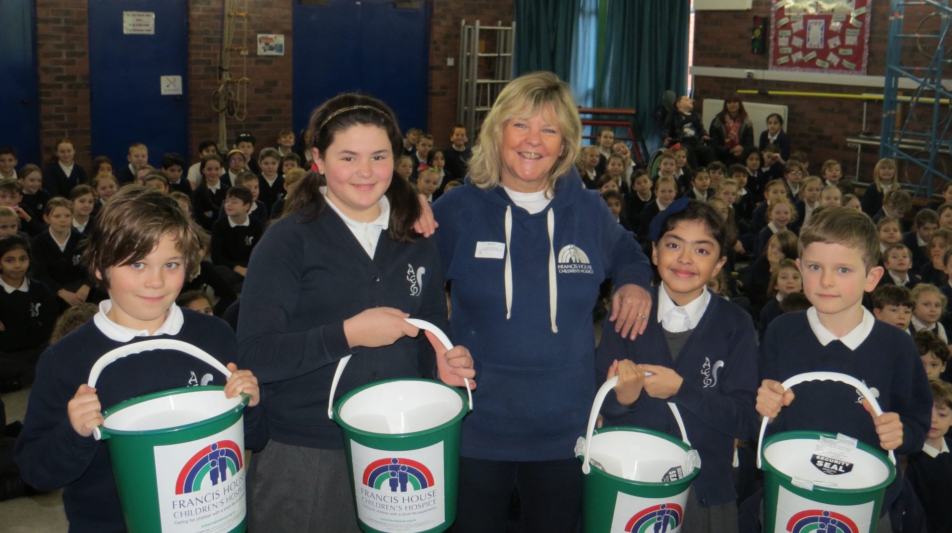 Alderley Edge Community School pupils fundraising with buckets