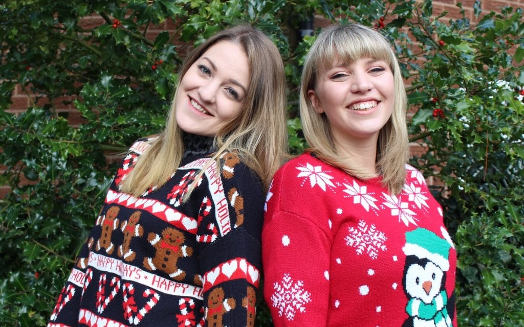 Rachel and Ellie wearing Christmas jumpers