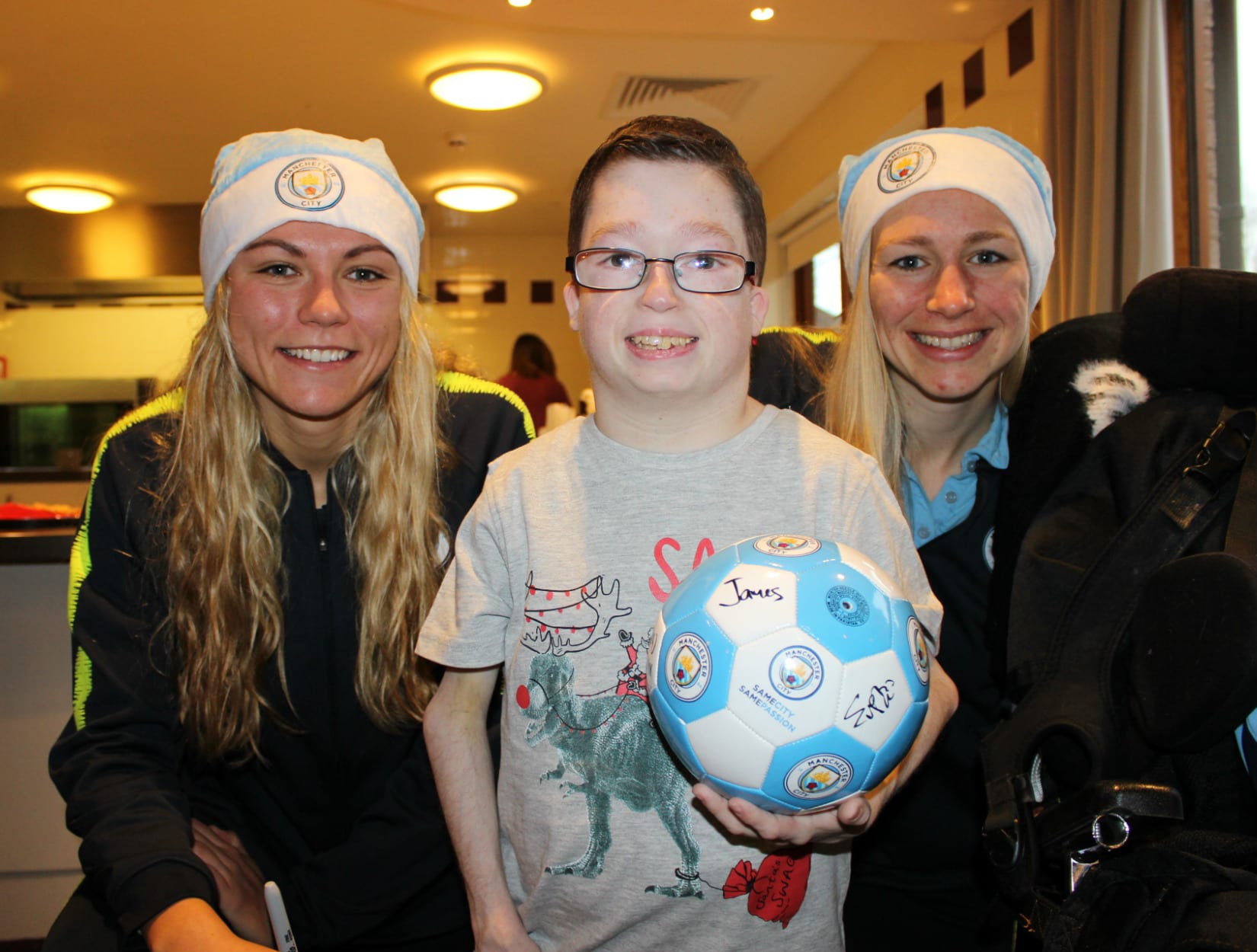 L-R Manchester City midfielder Claire Emslie with James and Manchester City forward Pauline Bremer.