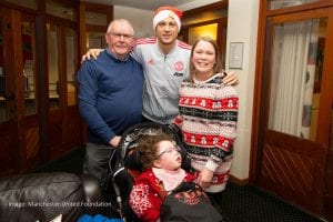 Evie and family with Nemanja Matic