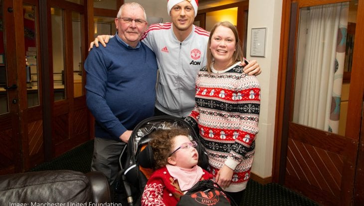 Evie and family with Nemanja Matic
