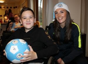 Josh with Manchester City forward Caroline Weir.