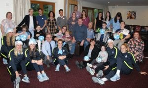 Manchester City's women's team with children, families and staff at Francis House