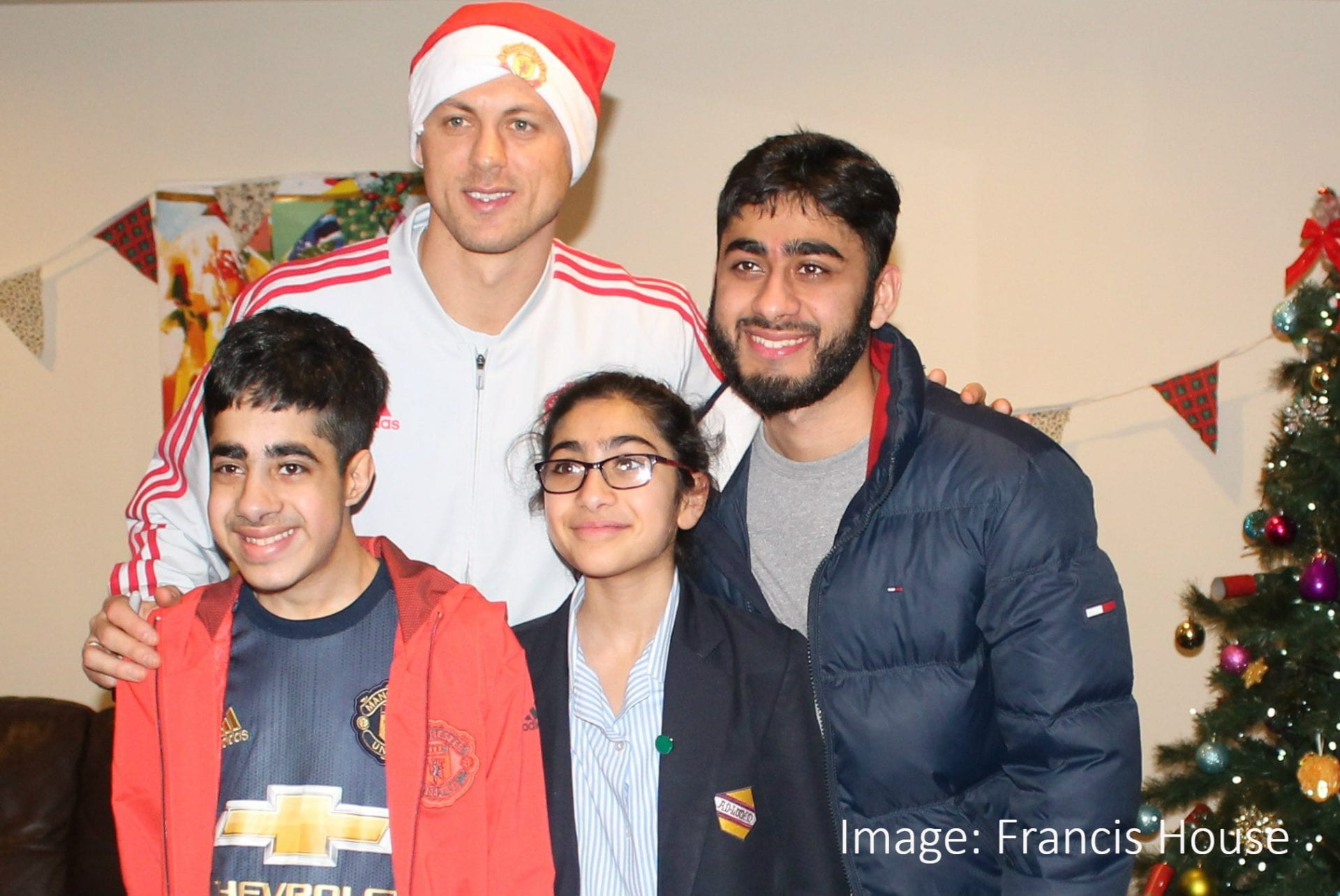 Faizan and family with Nemanja Matic