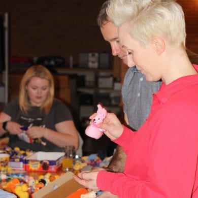 Barclays staff packing knitted bunnies