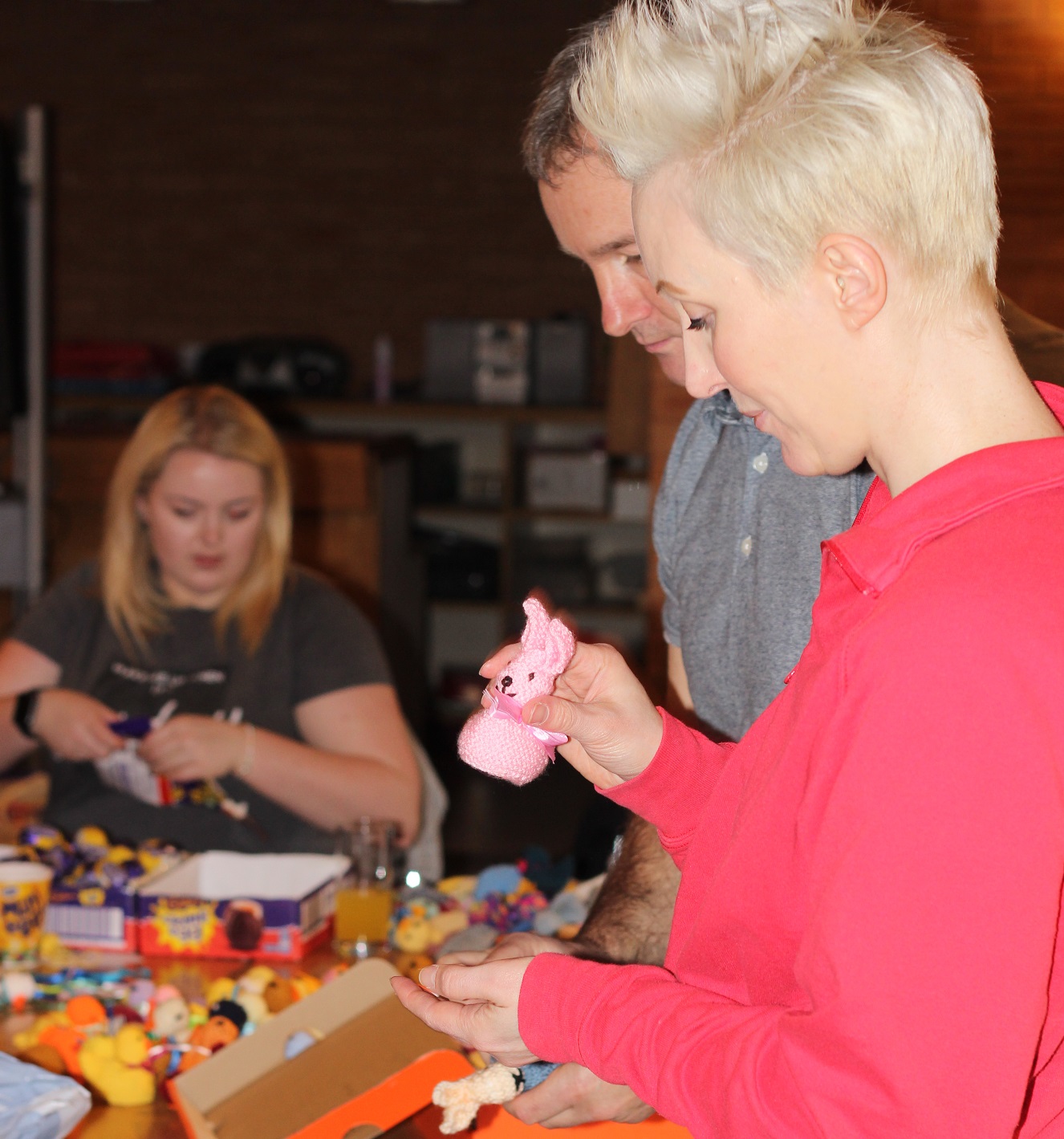 Barclays staff packing knitted bunnies