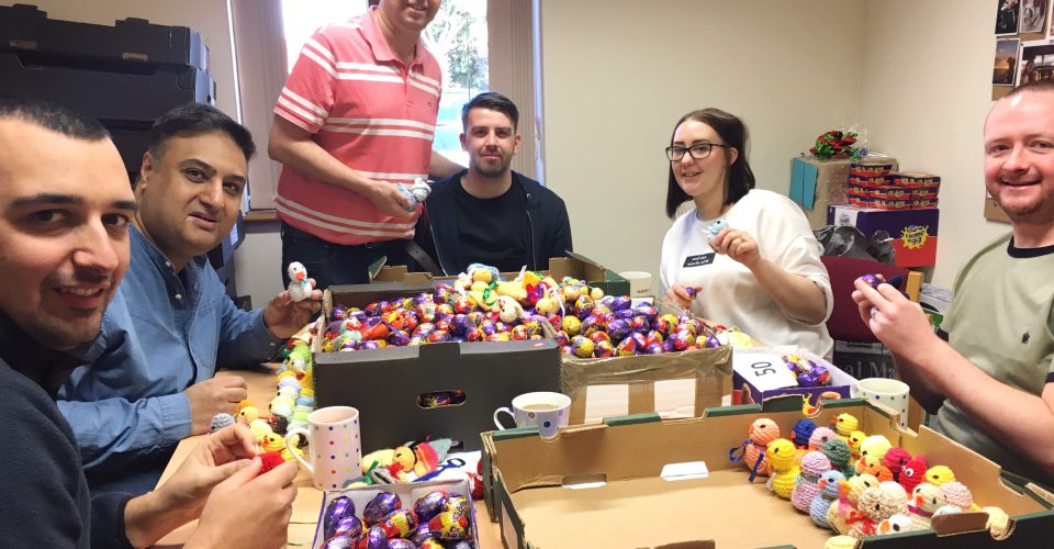 Barclays staff stuffing chicks with creme eggs.