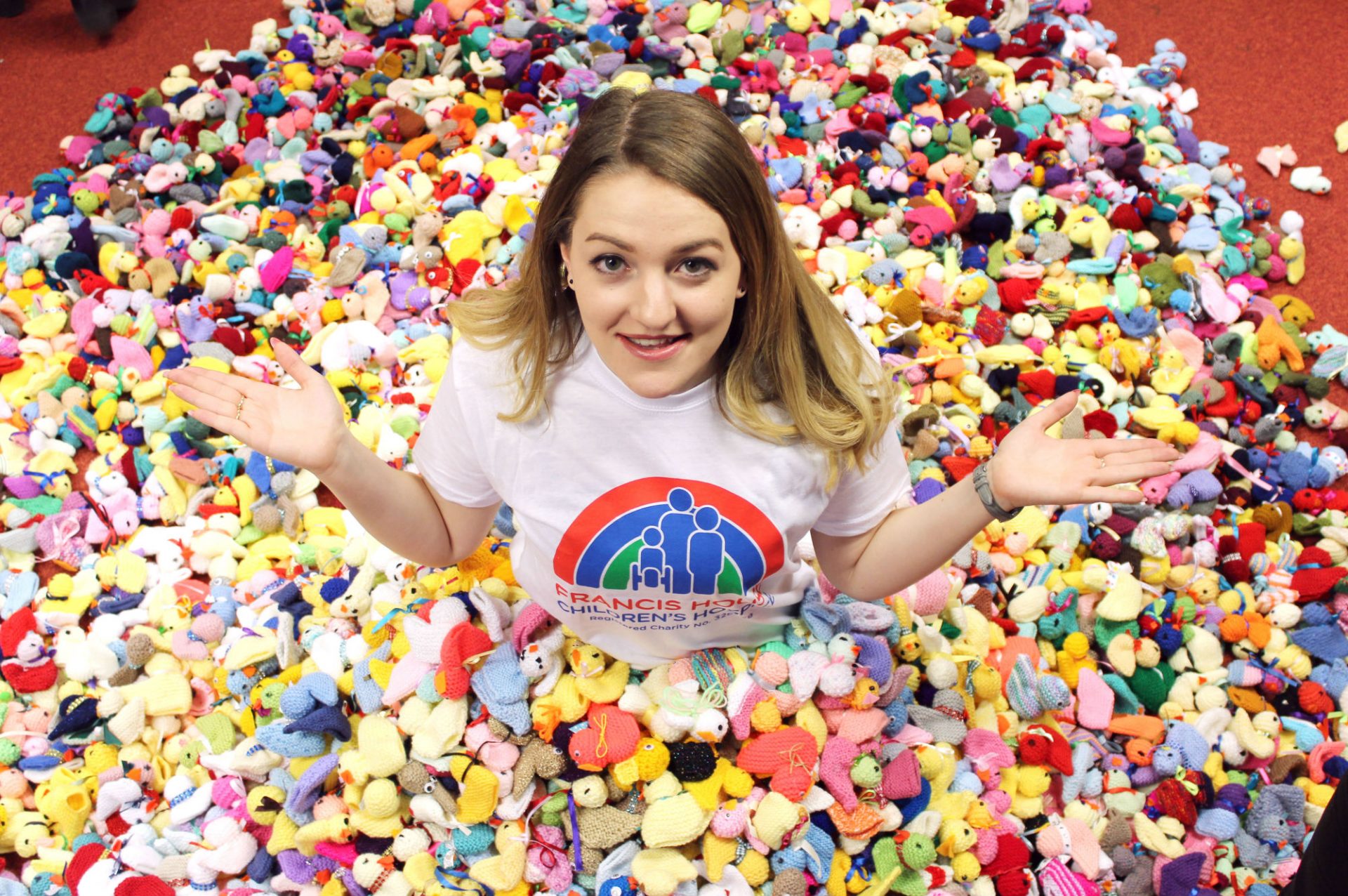 Rachael Astill surrounded by knitted chicks