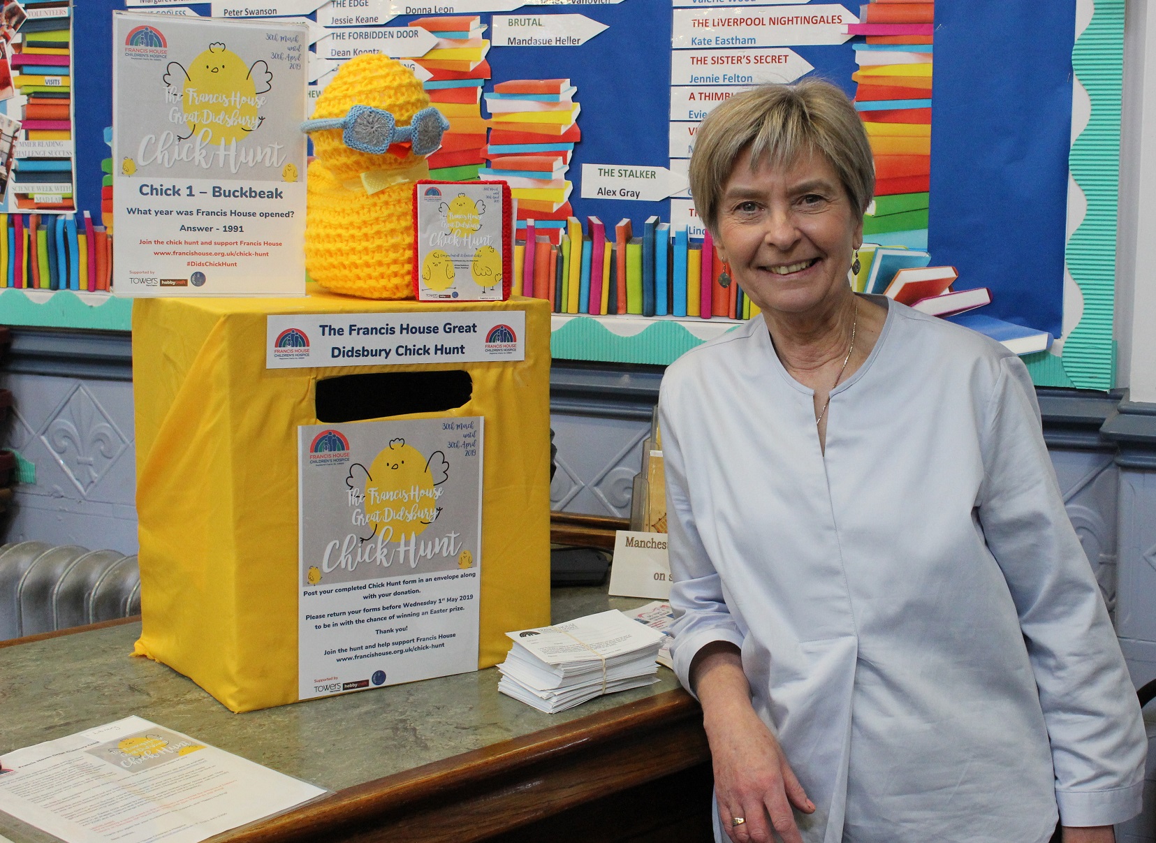Jane Riley at the Chick Hunt postbox in Didsbury Library.