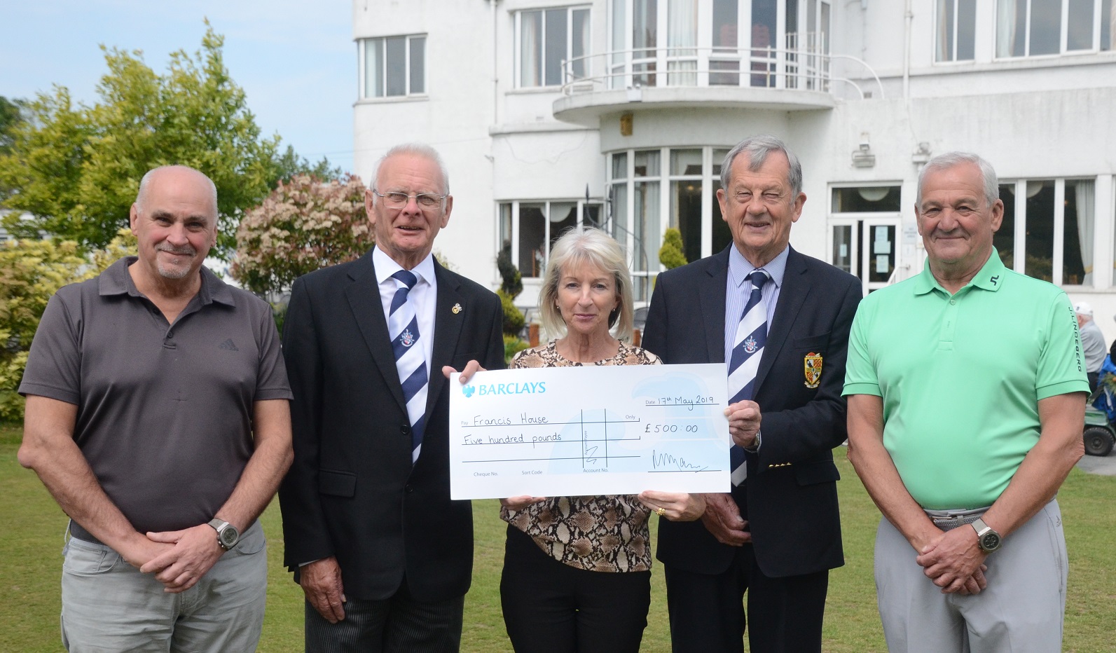 Chris Gillespie (left), Jim Hardman, Louie Gillespie, David Marsden and Rob Gillespie with funds from the Peter Gillespie memorial golf day in aid of Francis House.
