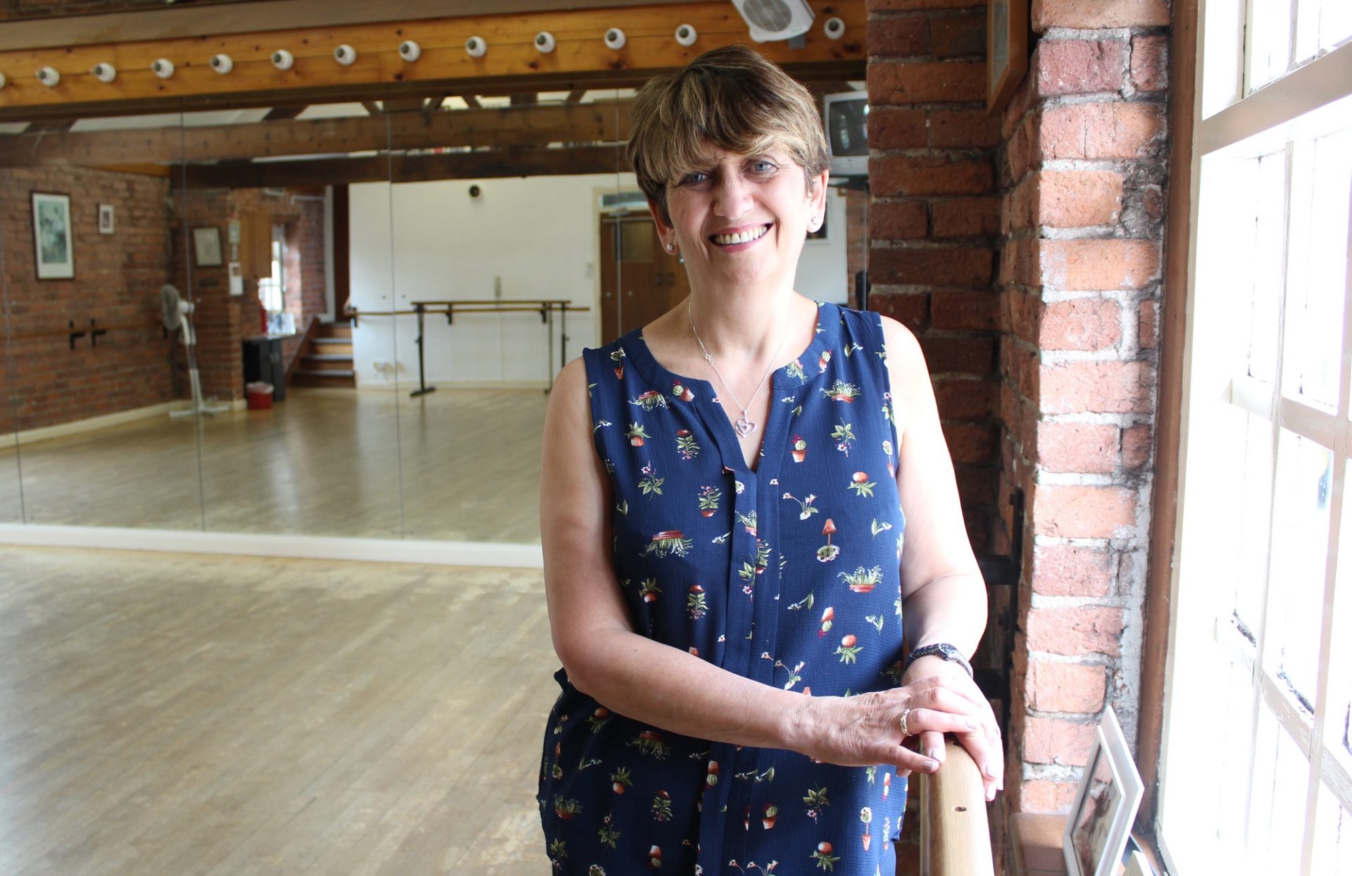 Person stood by window in dance studio