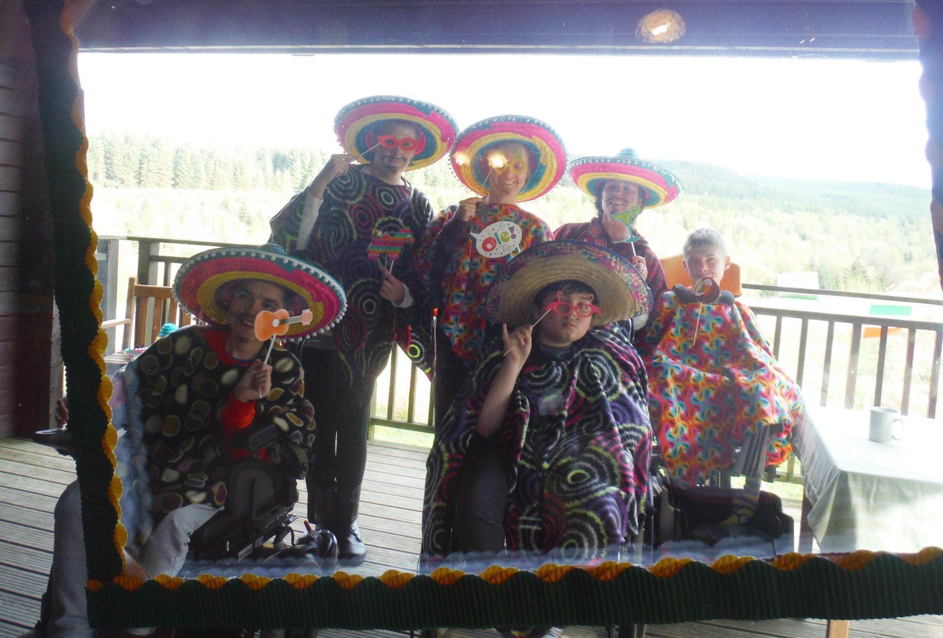 People in Mexican party clothes