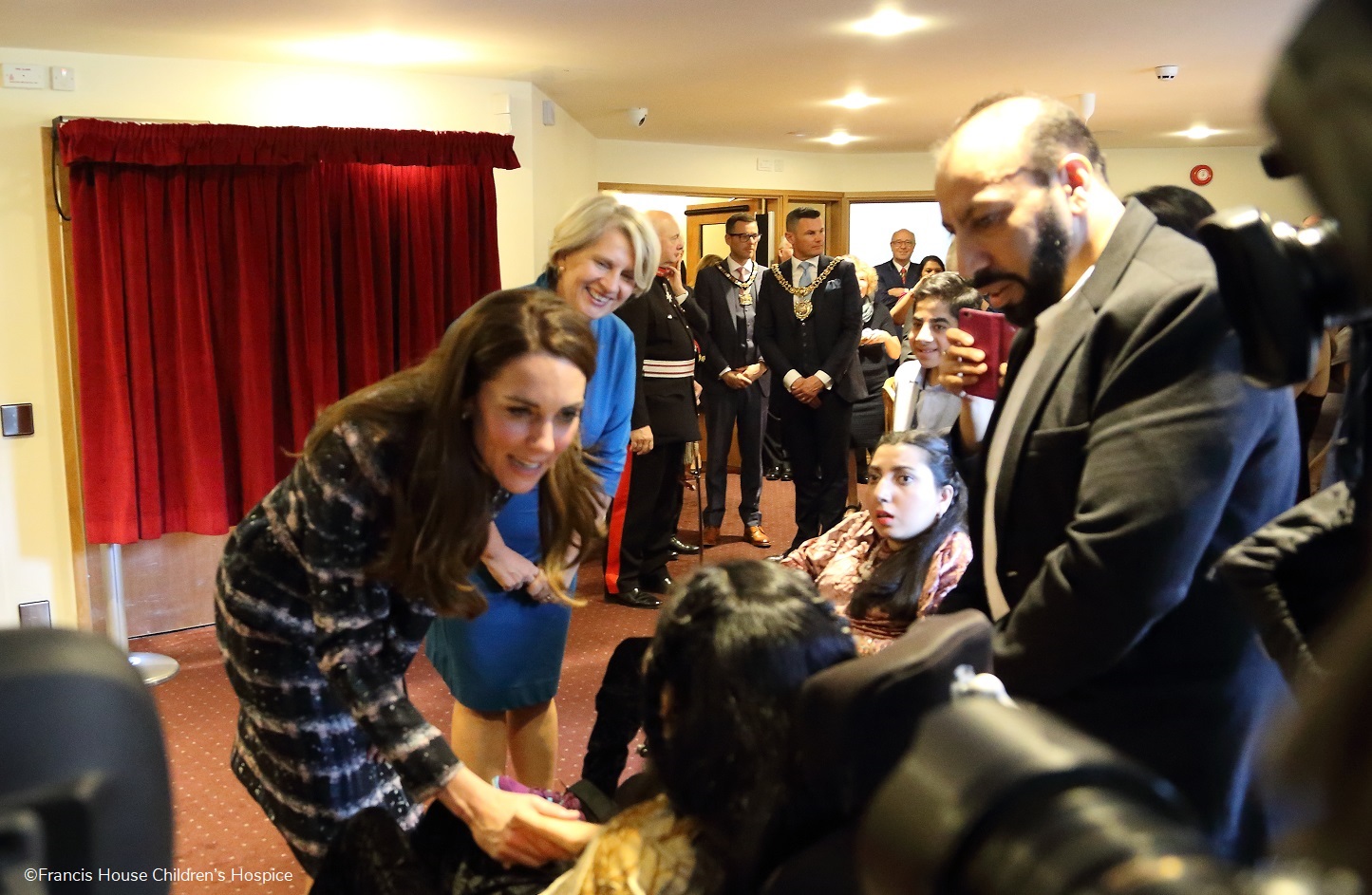 The Duchess of Cambridge meeting young adults and families in Francis Lodge