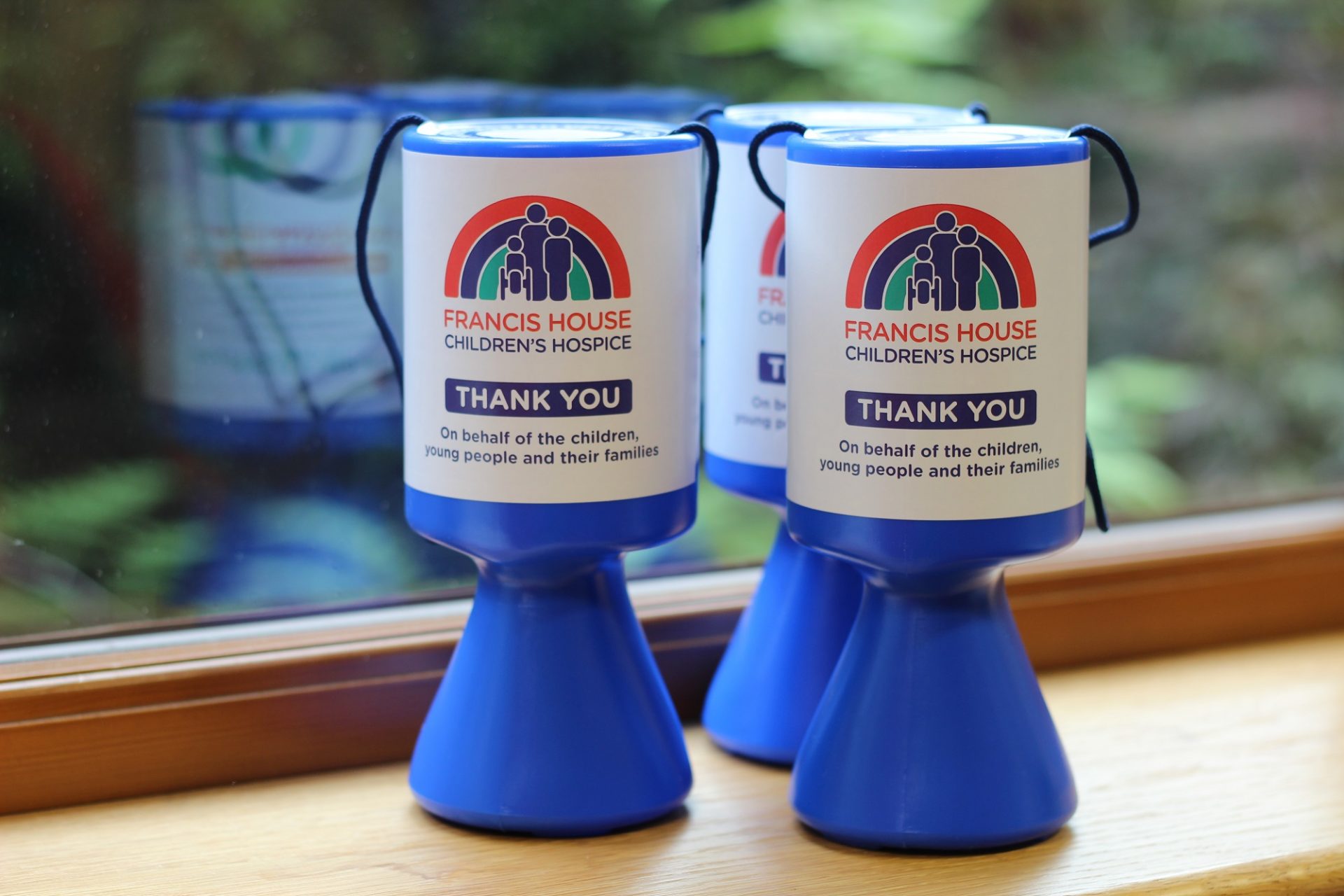 Francis House charity collection tins