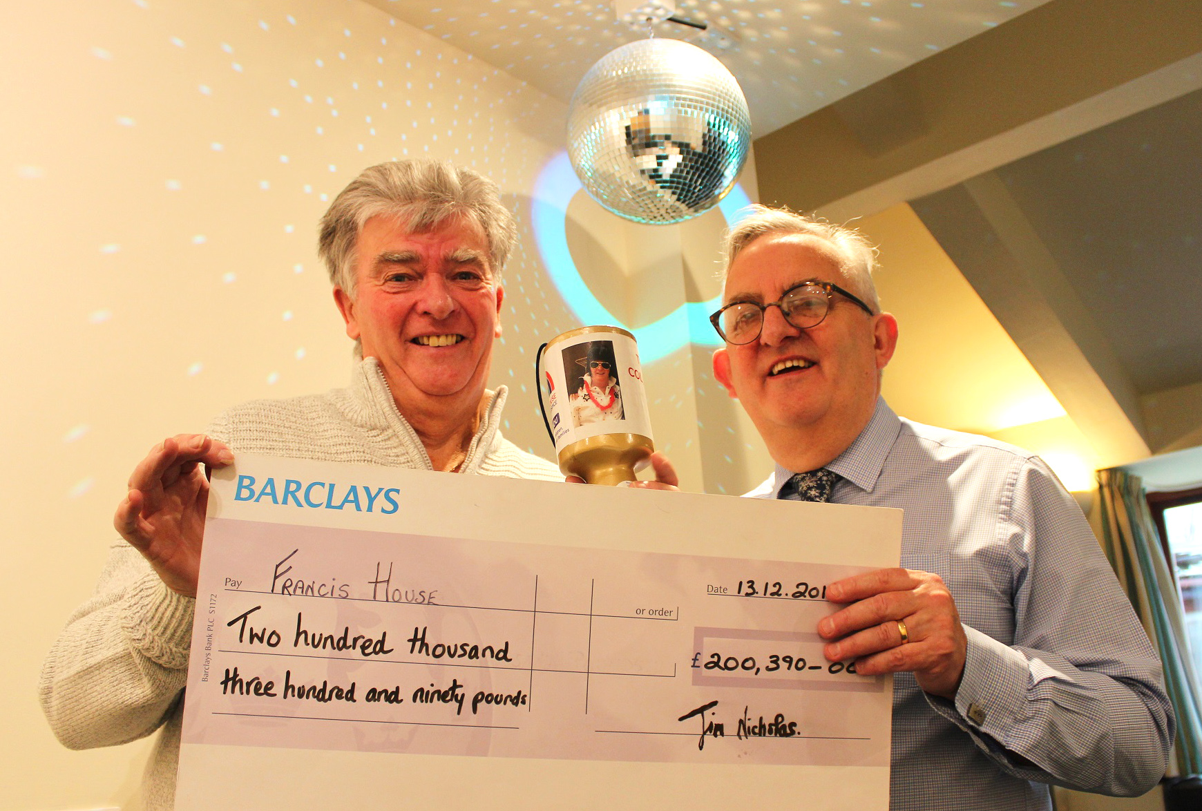 Jim Nicholas with cheque for David Ireland