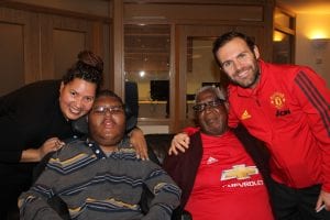 Mancheter United player with Francis House family