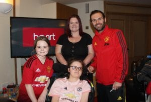 Mancheter United player with Francis House family