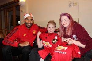 Mancheter United player with Francis House family