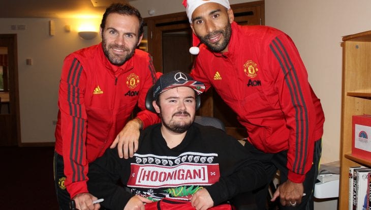 Manchester United players with Francis House family