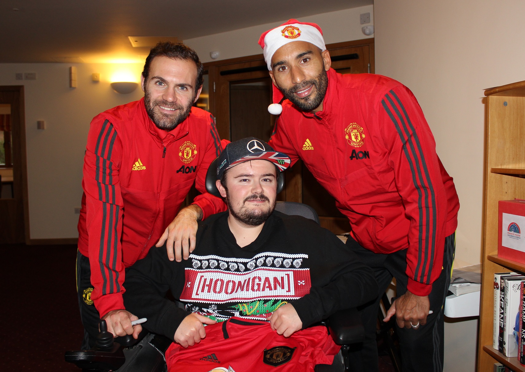 Manchester United players with Francis House family
