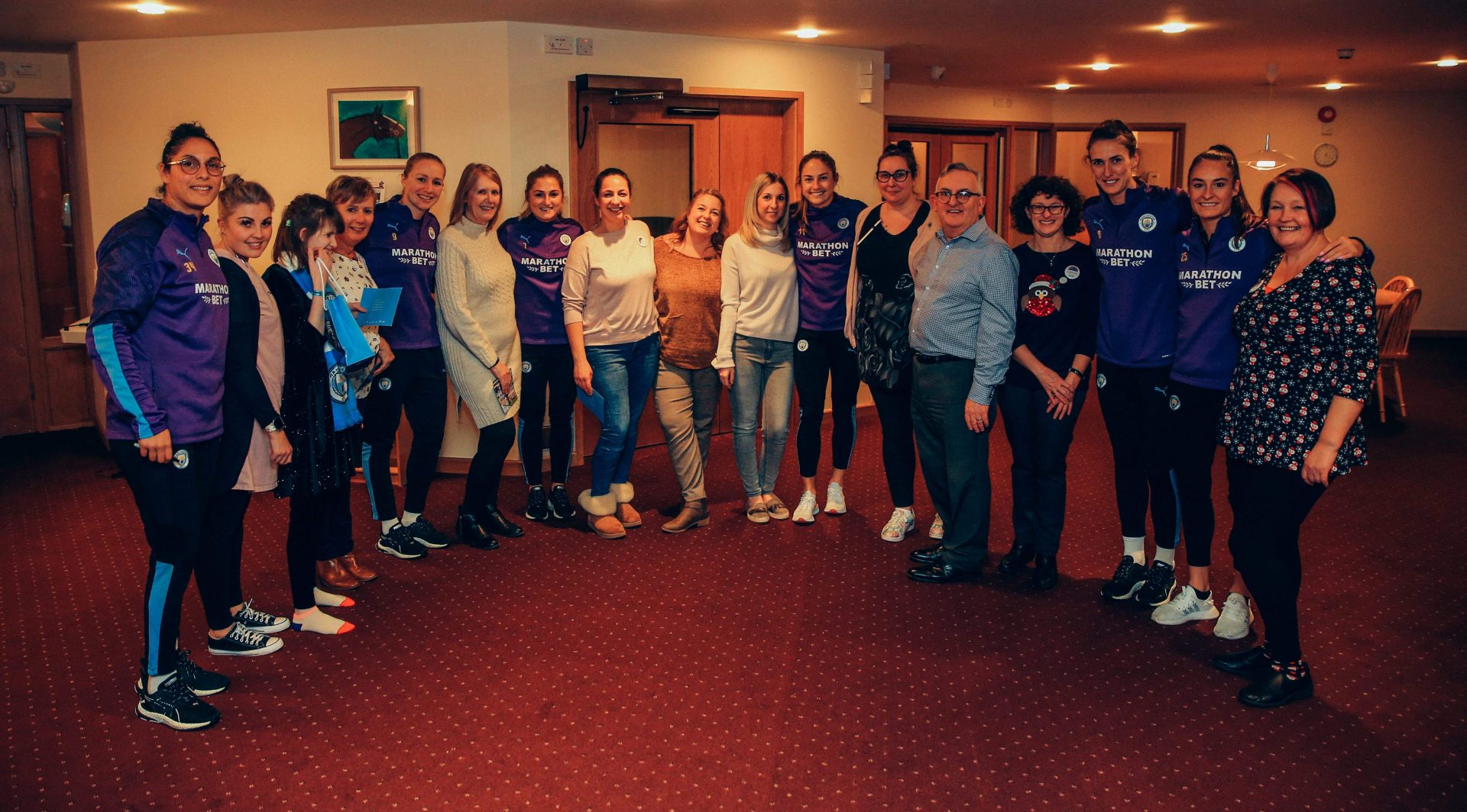 Manchester City women's team players at Francis House