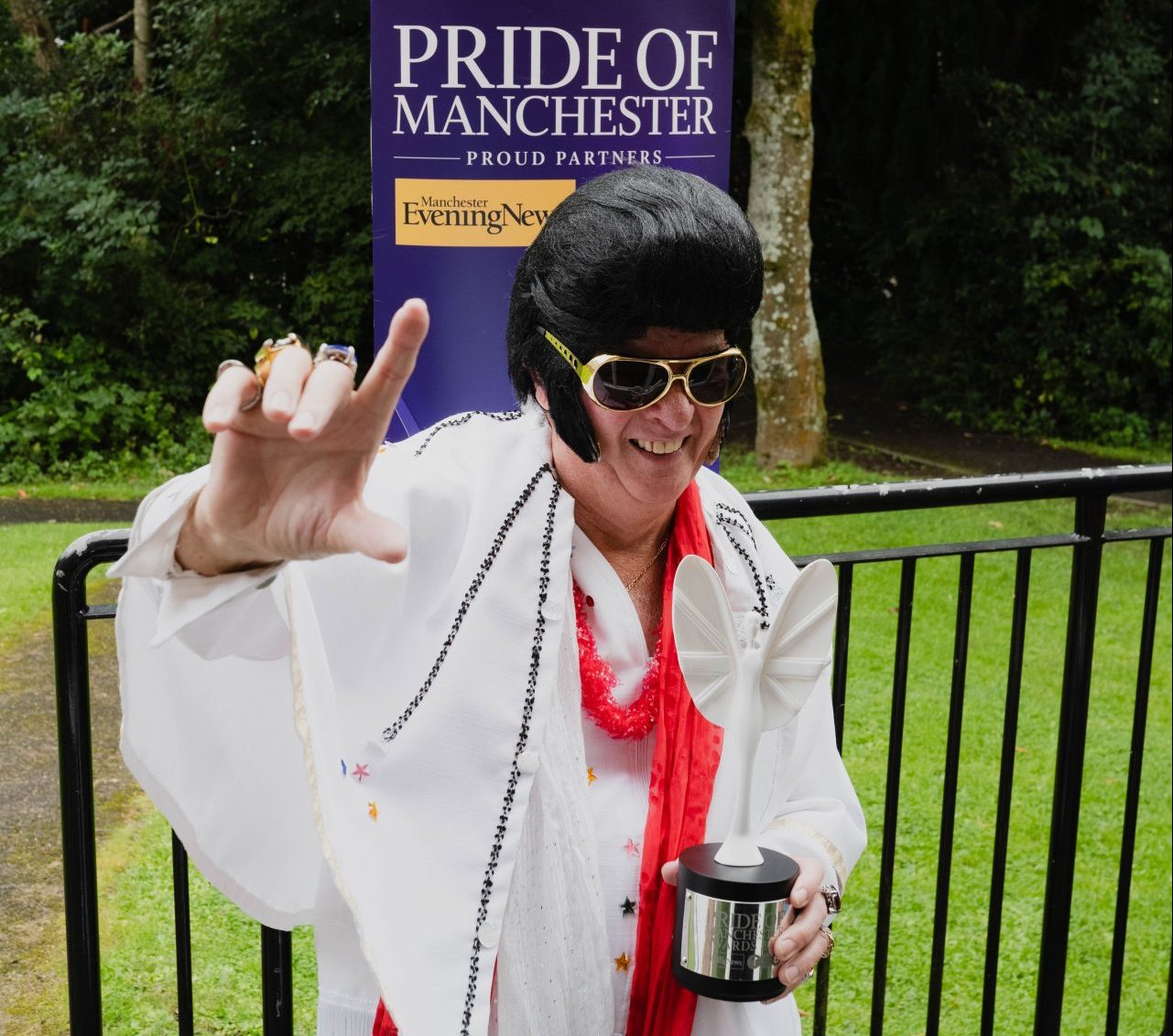 Jim Nicholas as Elvis with Pride of Manchester trophy