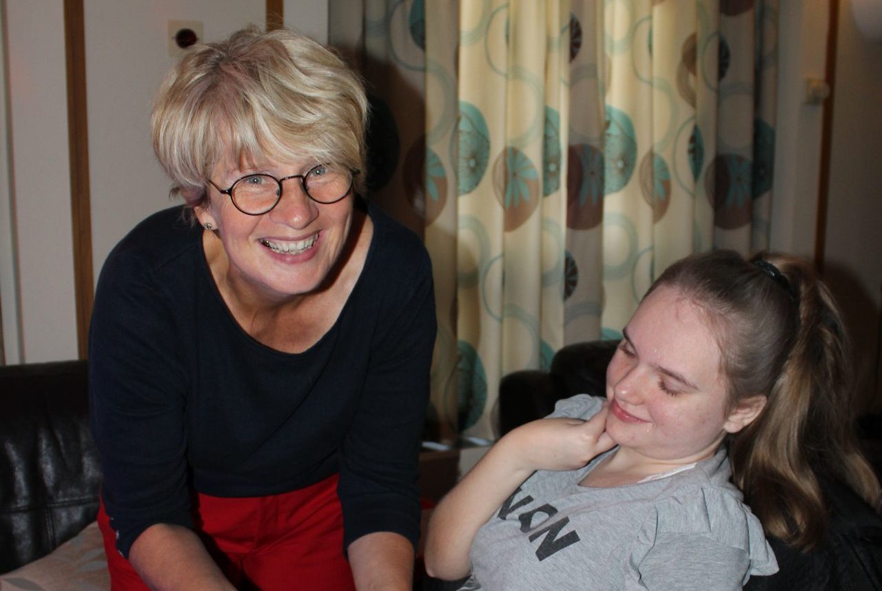 Gill Bevin with a young person at Francis House