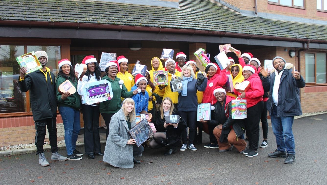 Group of people with Christmas presents