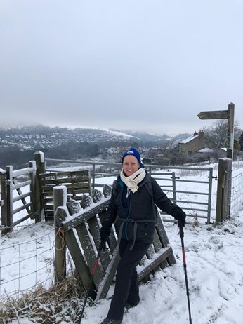 Woman walking in snow