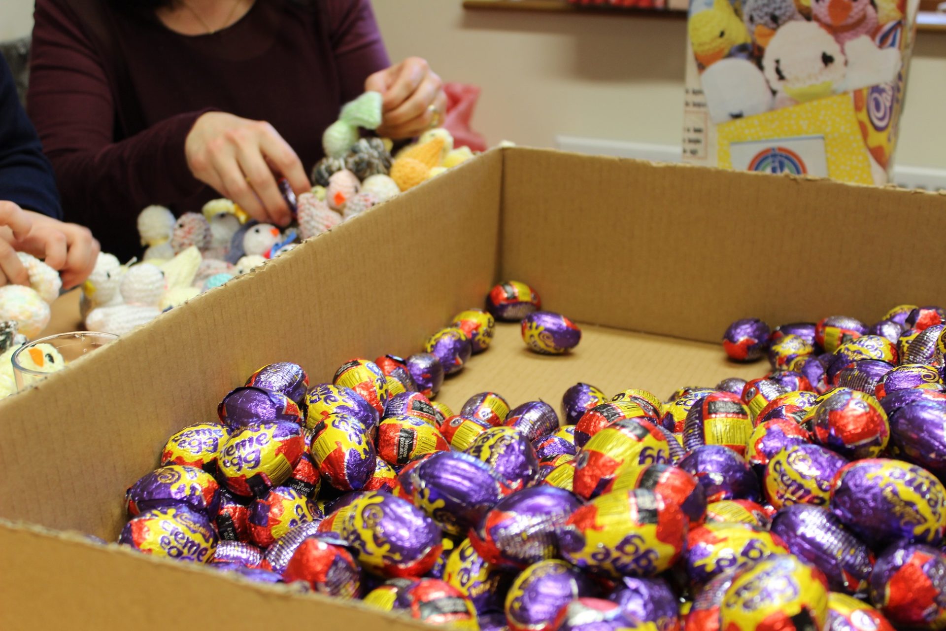 box creme eggs filling into knitted chicks