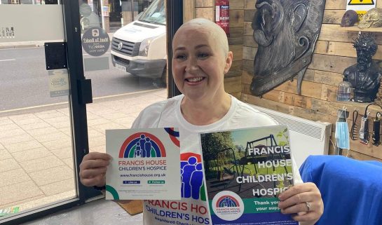 Woman after charity head shave for Francis House