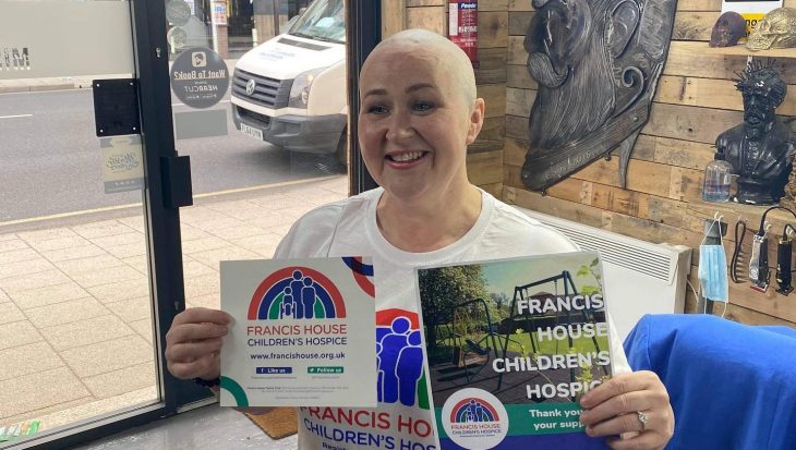 Woman after charity head shave for Francis House