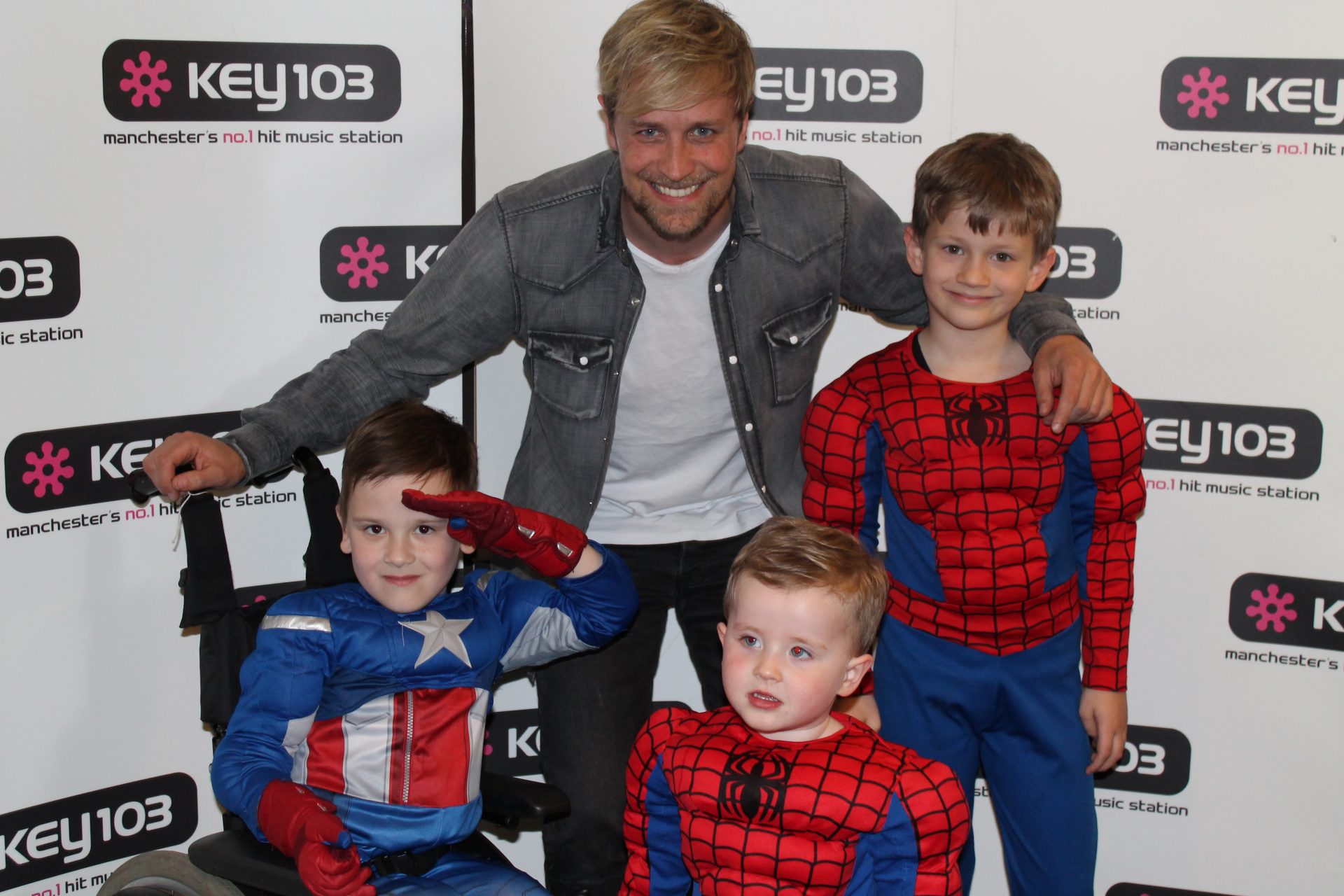 Children dressed as super heroes with celebrity