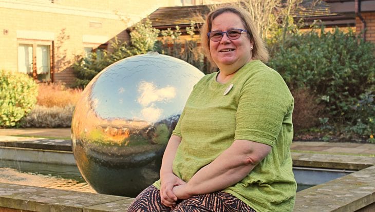 Dawn Geddes sat by fountain at Francis House