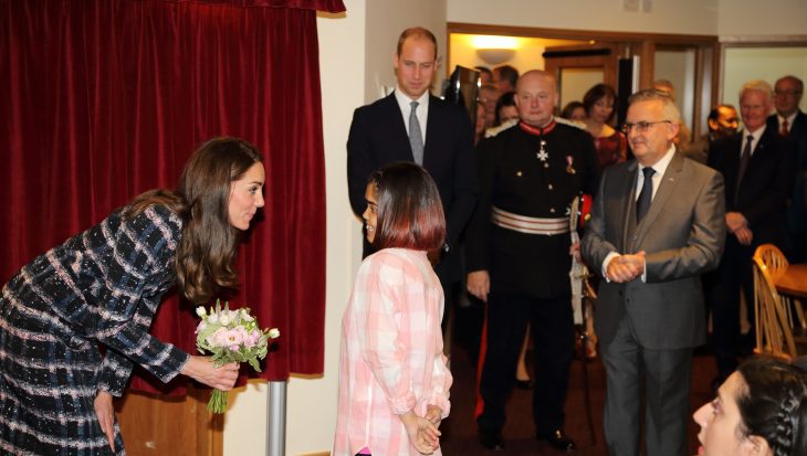 Duchess of Cambridge with little girl at Francis House