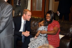 Duke of Cambridge with mum Sharon Nelson and her child Angel