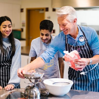 Teenagers and young adults baking in Francis Lodge