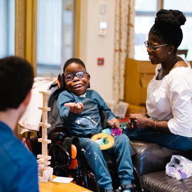 Thabani and Busi in the lounge on respite care