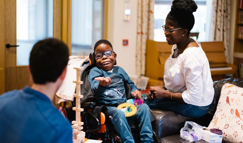 Thabani and Busi in the lounge on respite care