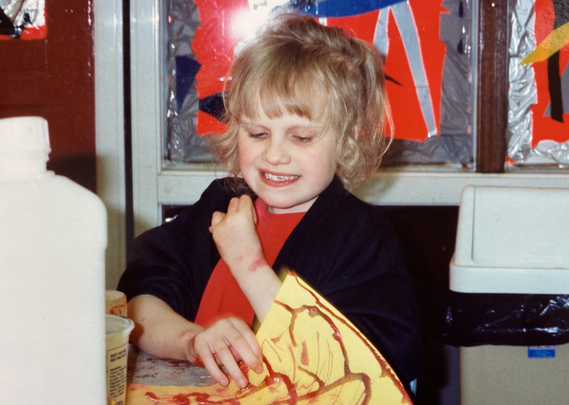 Kerry as a child doing crafts